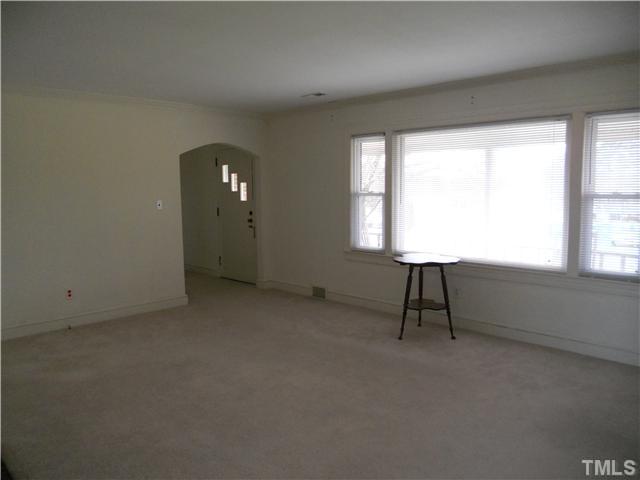 2505 Old Durham Road Roxboro, NC 27573 - Photo 8 of 18 a view of an empty room with a window