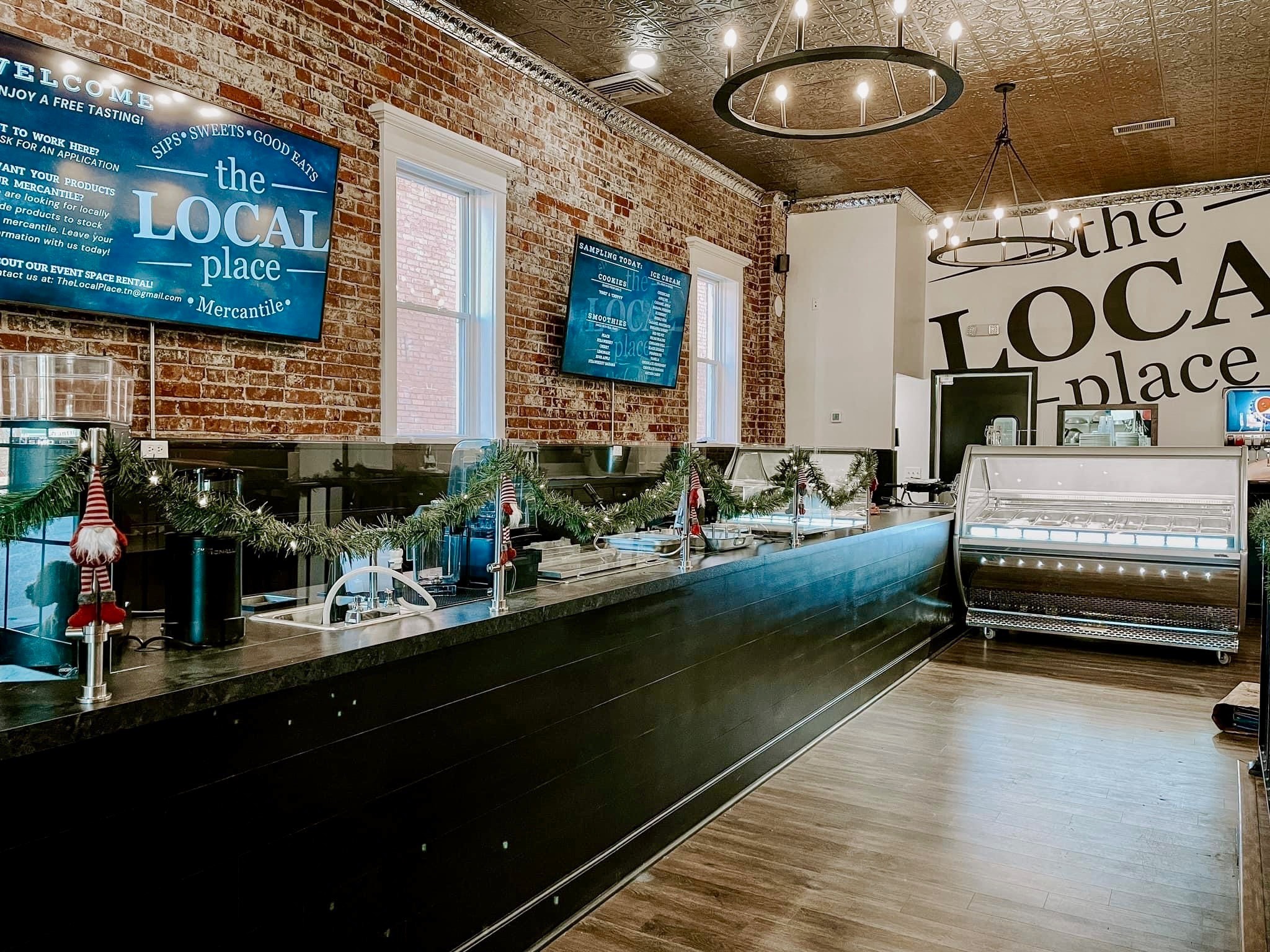 317 Highway 100 Centerville, TN 37033 - Photo 11 of 13 a kitchen with a table and chairs in it