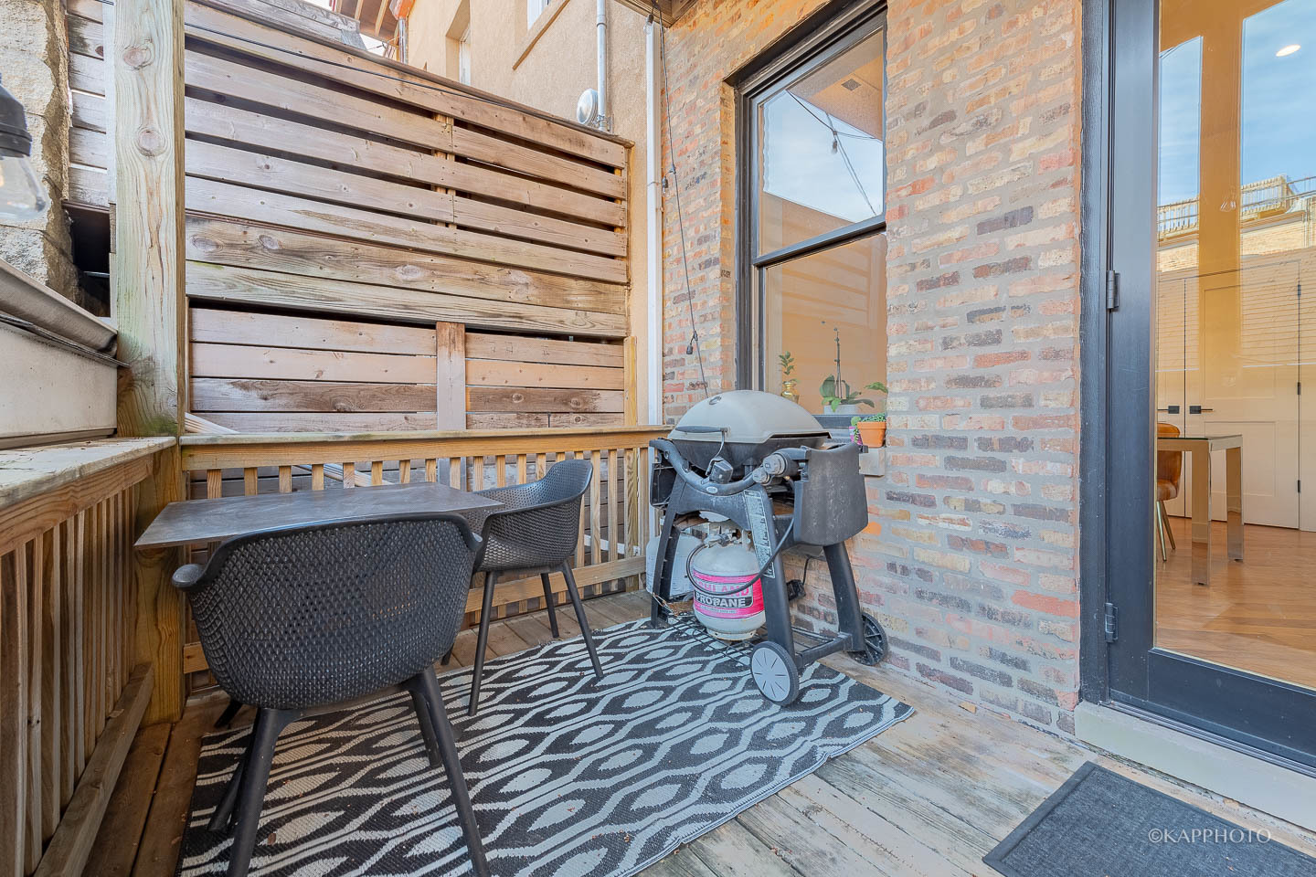 15 North Ada Street Chicago, IL 60607 - Photo 12 of 41 a view of a chairs on the deck