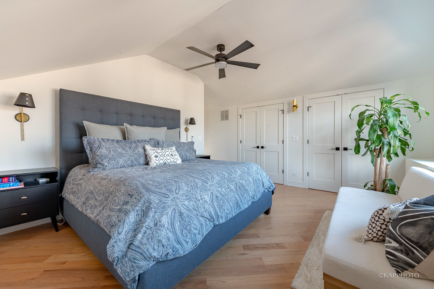 15 North Ada Street Chicago, IL 60607 - Photo 28 of 41 a spacious bedroom with a bed and a couch