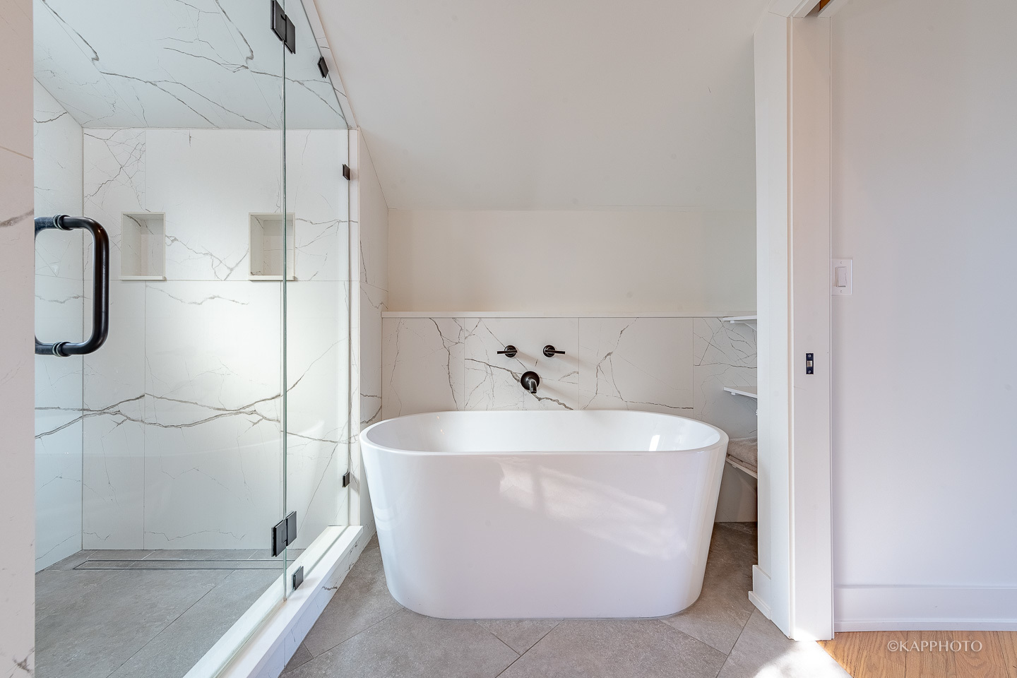 15 North Ada Street Chicago, IL 60607 - Photo 29 of 41 a white bath tub sitting in a bathroom