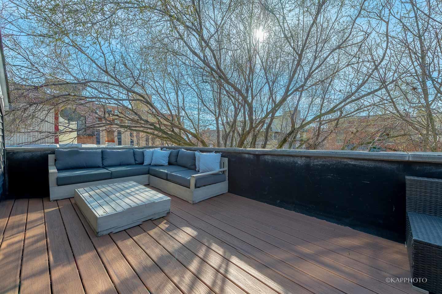 15 North Ada Street Chicago, IL 60607 - Photo 32 of 41 a view of backyard with sitting area