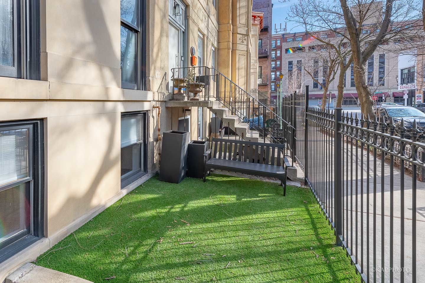 15 North Ada Street Chicago, IL 60607 - Photo 35 of 41 a view of a porch with a yard