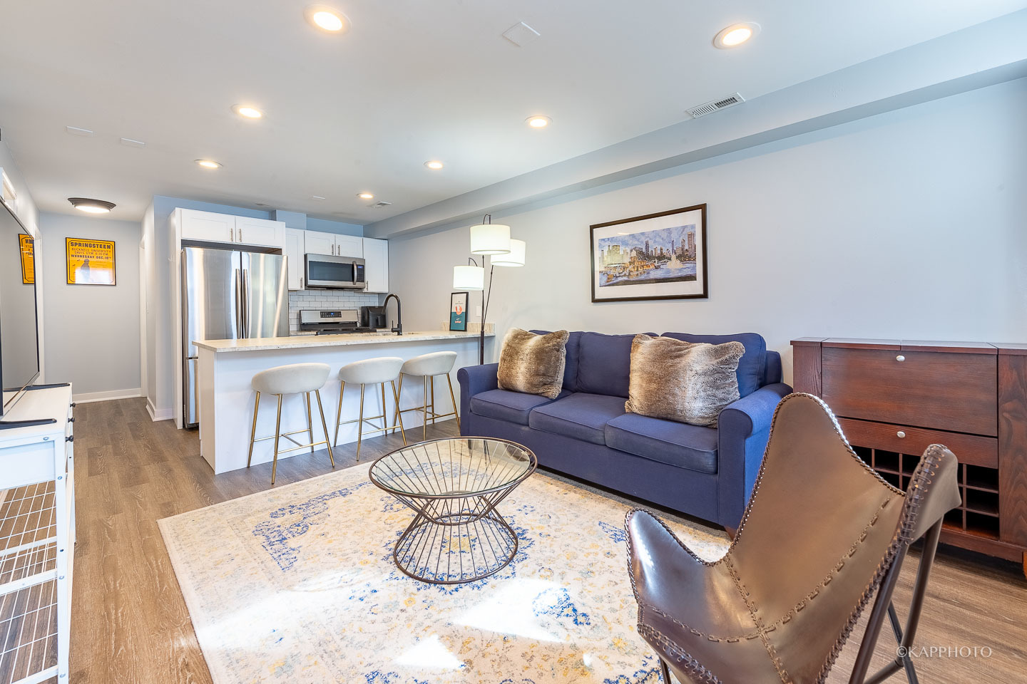 15 North Ada Street Chicago, IL 60607 - Photo 36 of 41 a living room with furniture and a wooden floor