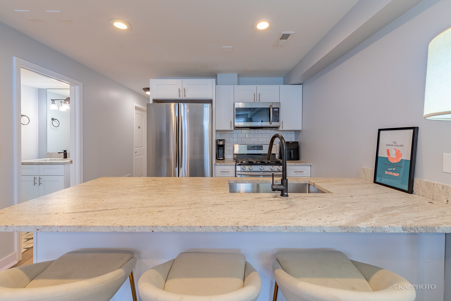 15 North Ada Street Chicago, IL 60607 - Photo 38 of 41 a kitchen with kitchen island a sink stove and refrigerator