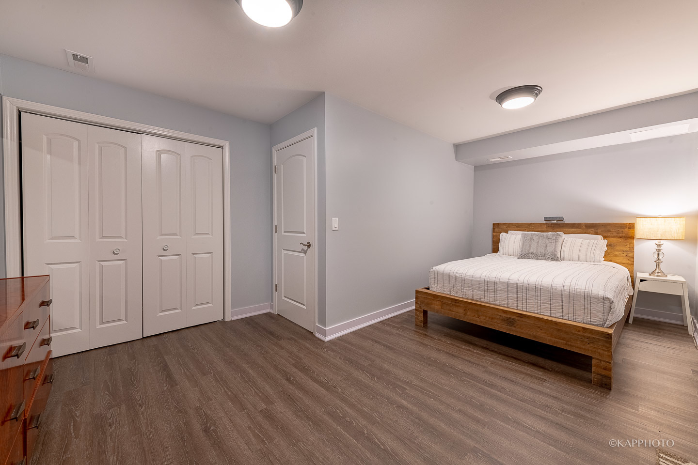 15 North Ada Street Chicago, IL 60607 - Photo 40 of 41 a bedroom with a bed and wooden floor