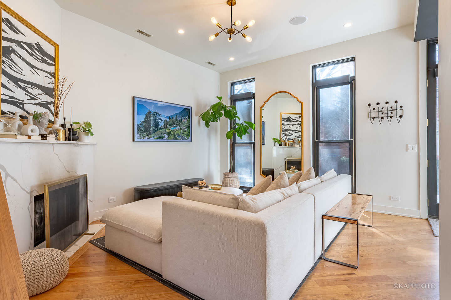 15 North Ada Street Chicago, IL 60607 - Photo 5 of 41 a living room with furniture chandelier and a fireplace