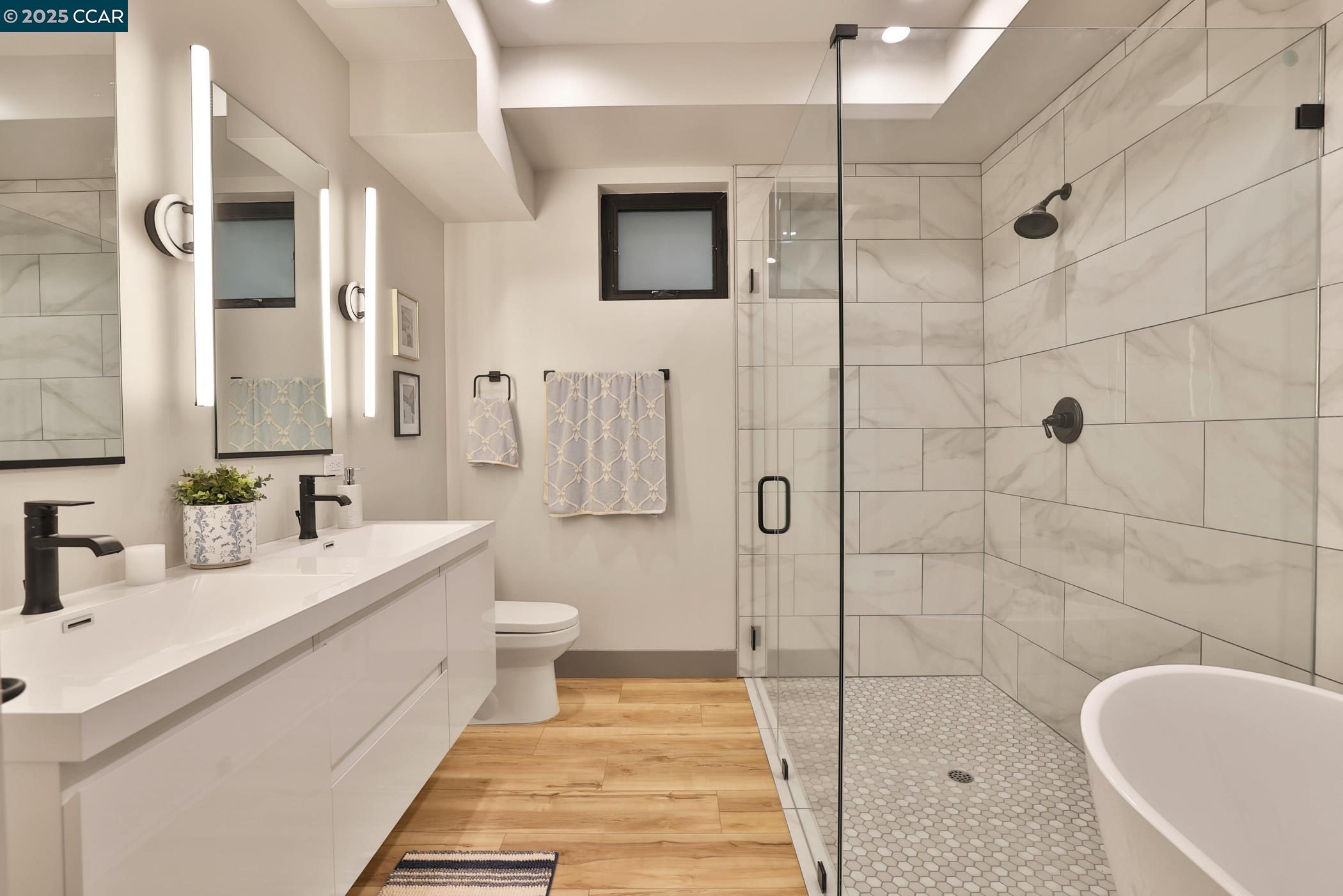 946 Risa Road, Unit A Lafayette, CA 94549 - Photo 11 of 17 a bathroom with a sink a toilet and shower