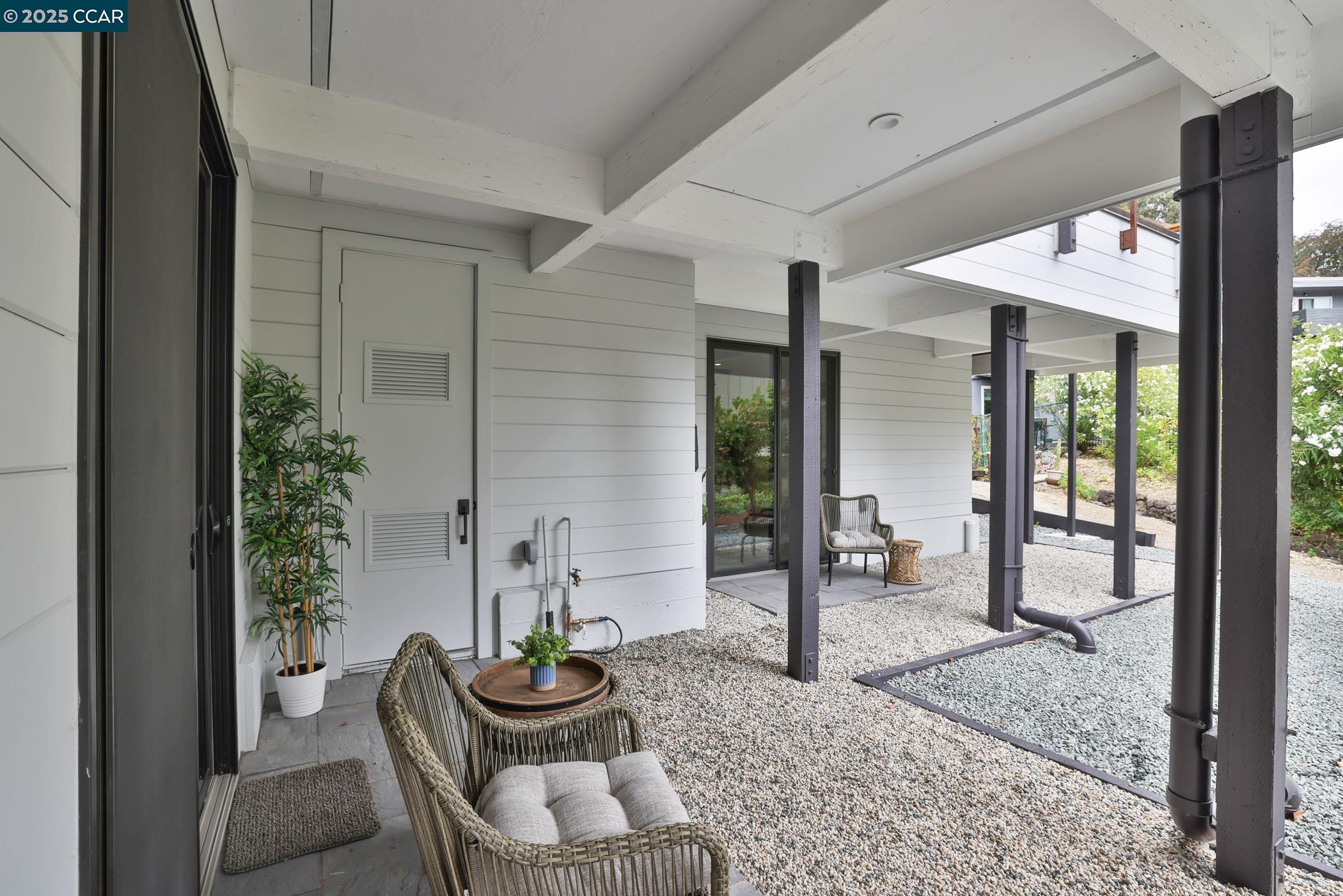 946 Risa Road, Unit A Lafayette, CA 94549 - Photo 16 of 17 a living room with furniture and a potted plant