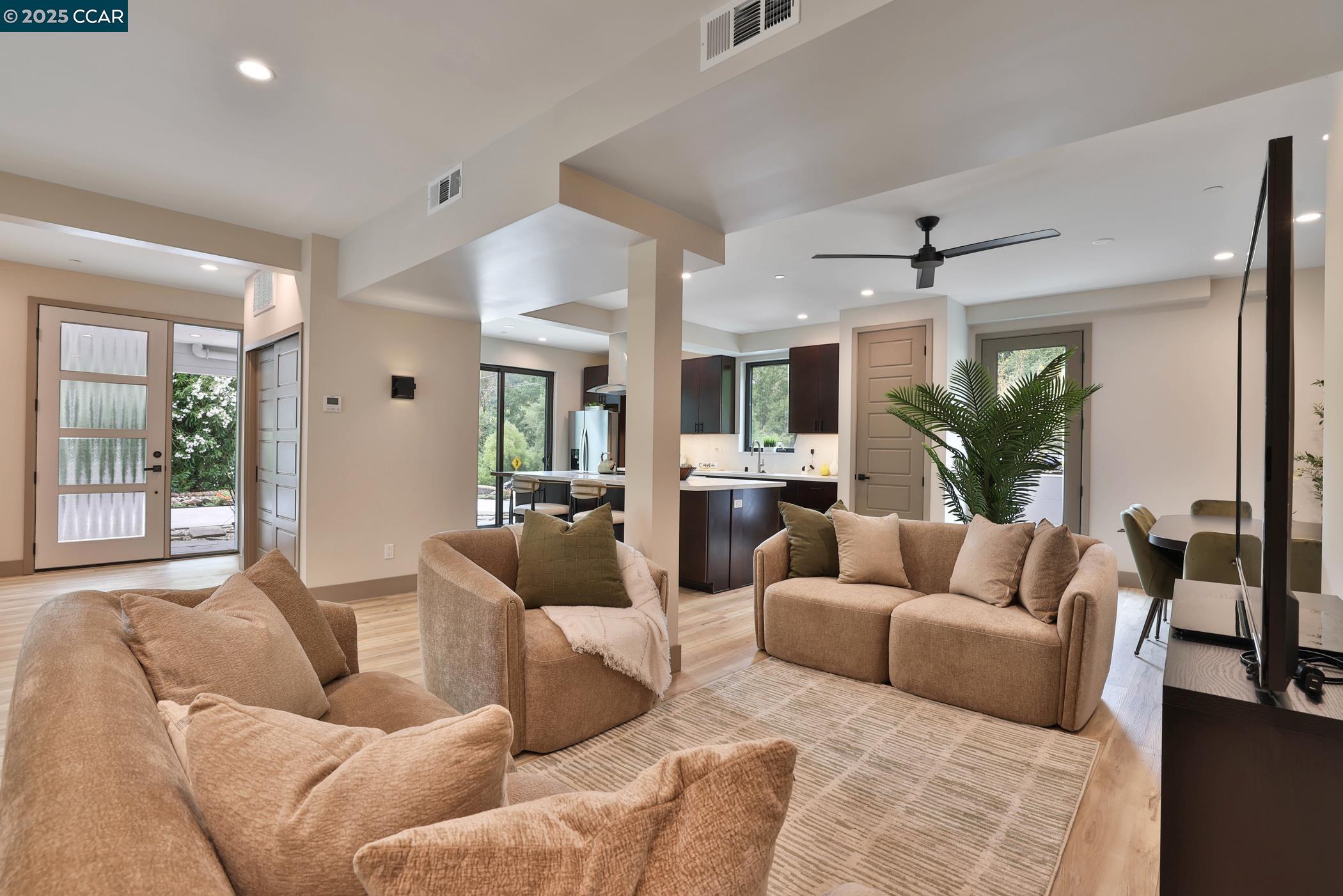 946 Risa Road, Unit A Lafayette, CA 94549 - Photo 6 of 17 a living room with furniture and a large window