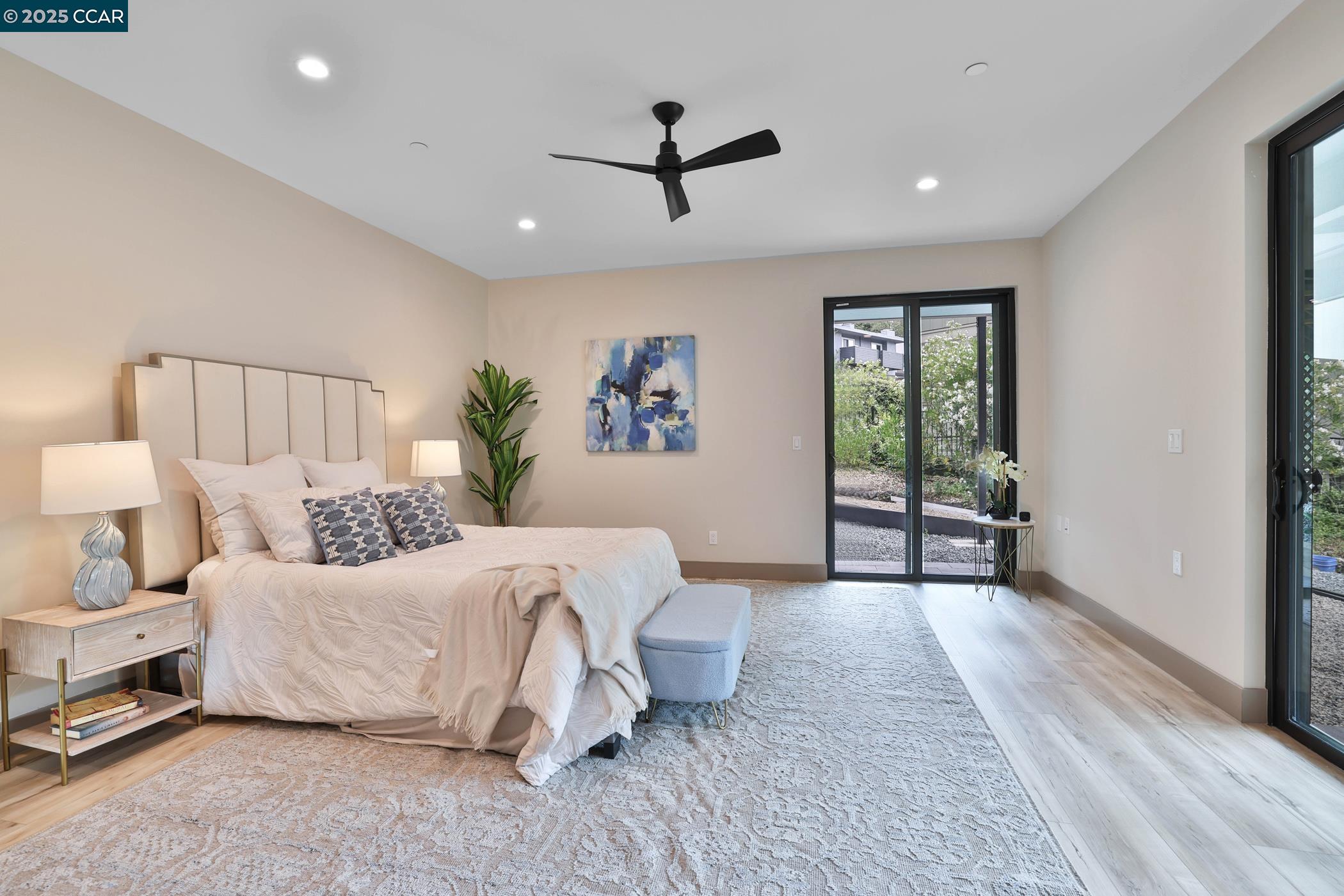 946 Risa Road, Unit A Lafayette, CA 94549 - Photo 10 of 17 a spacious bedroom with a bed and a window