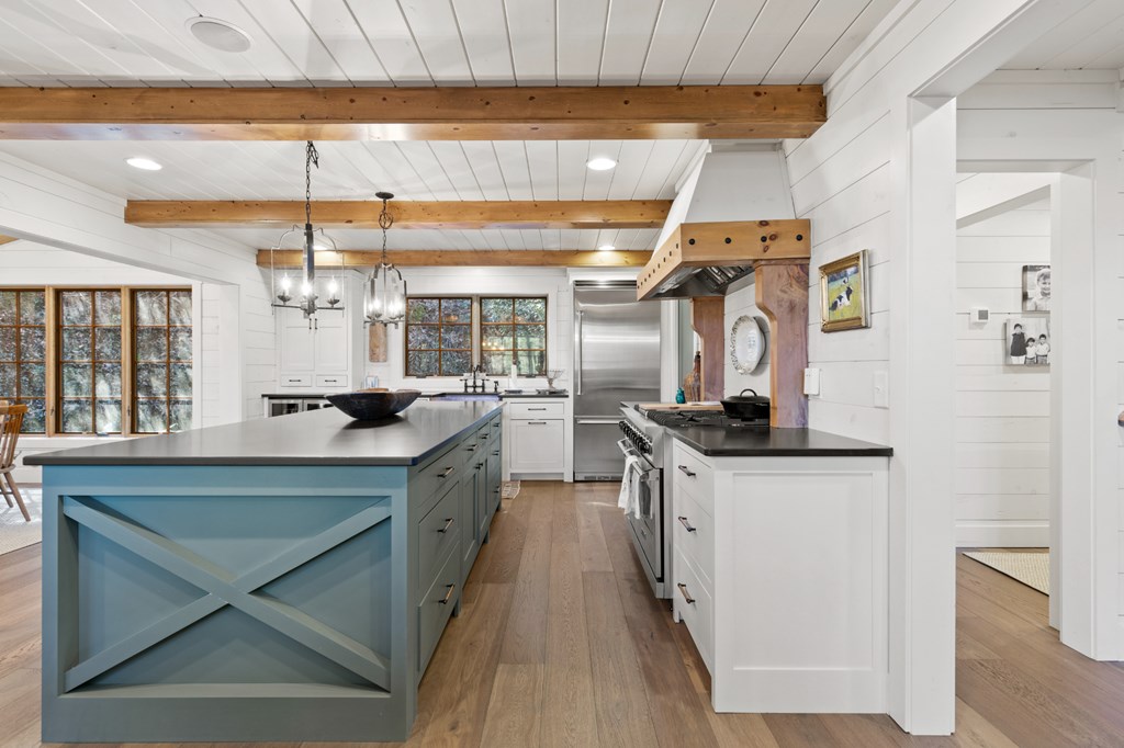 106 Little Rock Creek Road Cherry Log, GA 30522 - Photo 12 of 95 a kitchen with stainless steel appliances granite countertop a sink a stove and a wooden floors