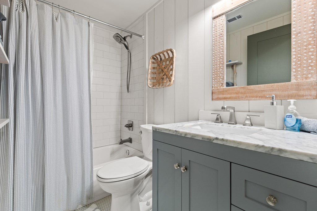 106 Little Rock Creek Road Cherry Log, GA 30522 - Photo 35 of 95 a bathroom with a granite countertop sink toilet and shower