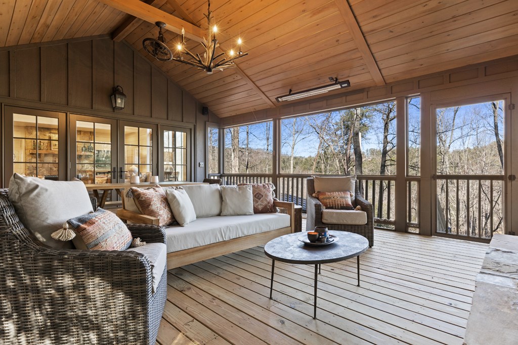 106 Little Rock Creek Road Cherry Log, GA 30522 - Photo 5 of 95 a living room with furniture and a floor to ceiling window