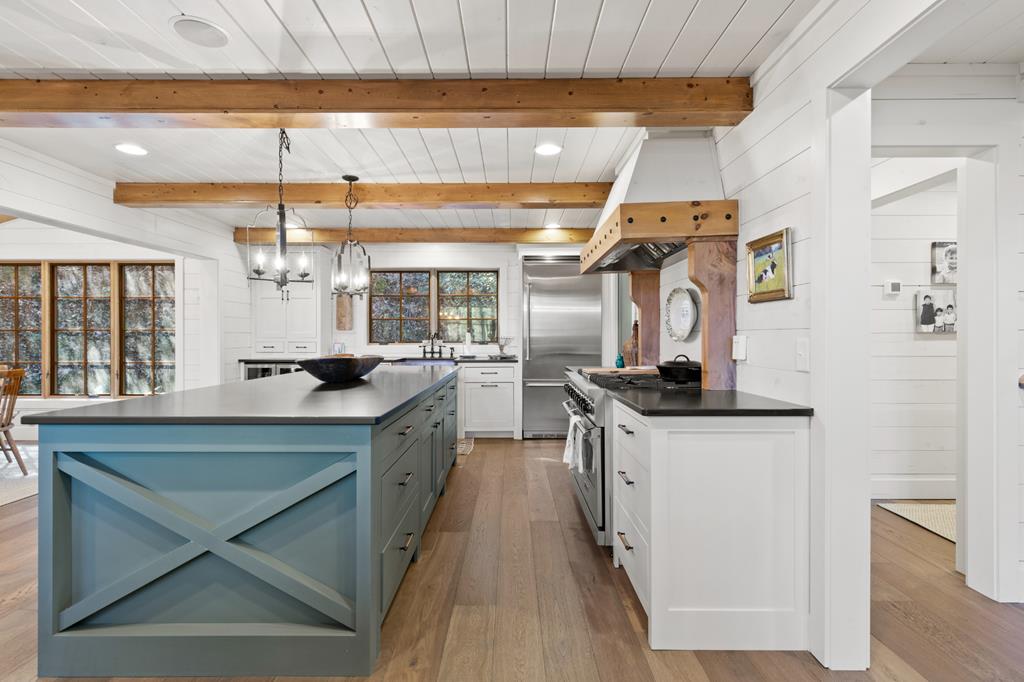 106 Little Rock Creek Road Cherry Log, GA 30522 - Photo 66 of 95 a kitchen with stainless steel appliances granite countertop a sink a stove and a wooden floors