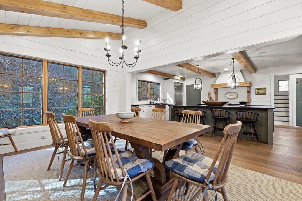 106 Little Rock Creek Road Cherry Log, GA 30522 - Photo 70 of 95 a view of a dining room with furniture window and wooden floor