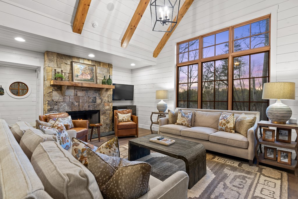 106 Little Rock Creek Road Cherry Log, GA 30522 - Photo 7 of 95 a living room with furniture fireplace and a large window