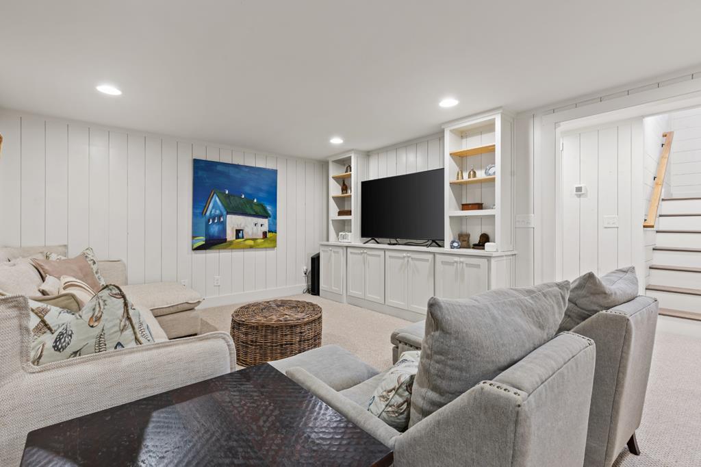 106 Little Rock Creek Road Cherry Log, GA 30522 - Photo 83 of 95 a living room with furniture and a flat screen tv
