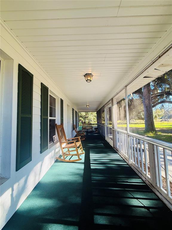 7223 South W 55 Street Bushnell, FL 33513 - Photo 17 of 70 a view of swimming pool with seating space