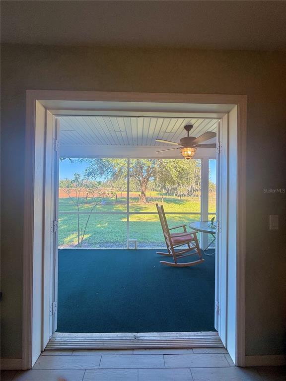 7223 South W 55 Street Bushnell, FL 33513 - Photo 25 of 70 a view of a room with wooden floor and windows