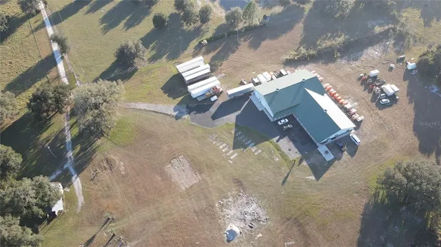 a bathroom with a sink a mirror and a shower