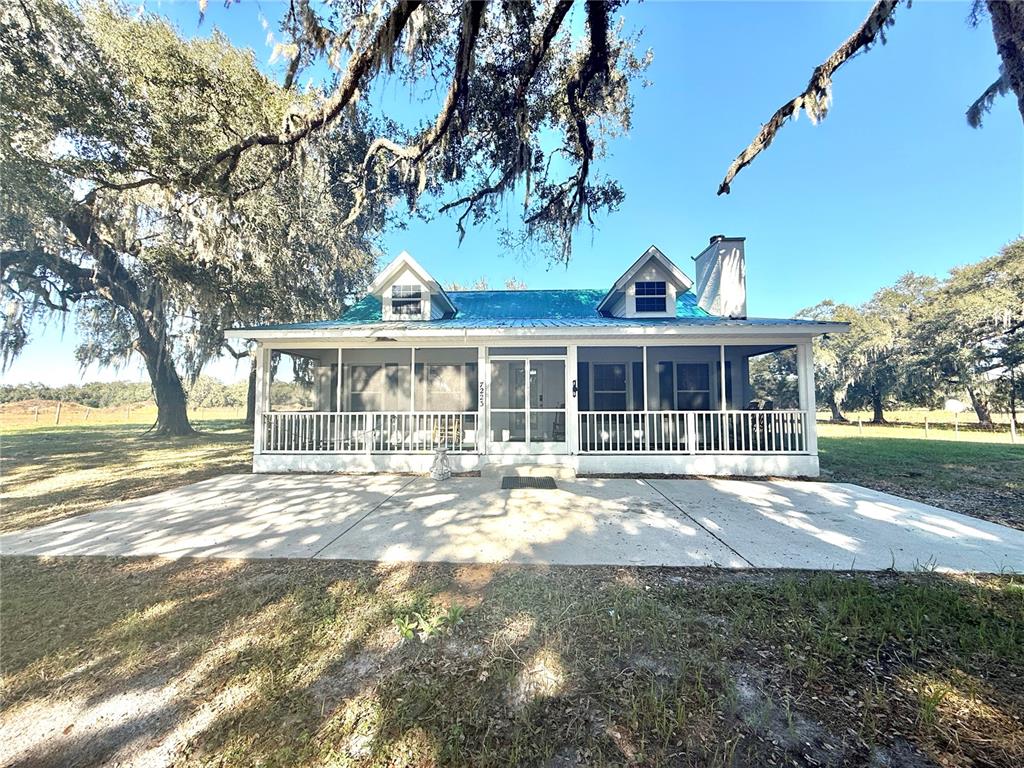 7223 South W 55 Street Bushnell, FL 33513 - Photo 8 of 70 a front view of house with yard and green space
