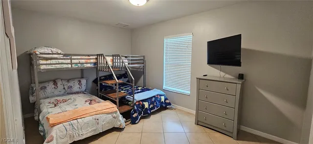 a bed and a table in a room