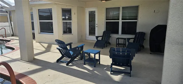 a workspace with furniture and a window