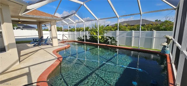 a view of a backyard with a patio