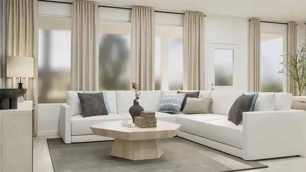 a living room with furniture and a large mirror