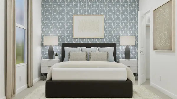 a bedroom with a bed and a night stand