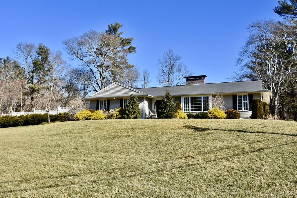 86 Snipatuit Road Rochester, MA 02770 - Photo 2 of 36 a front view of a house with swimming pool