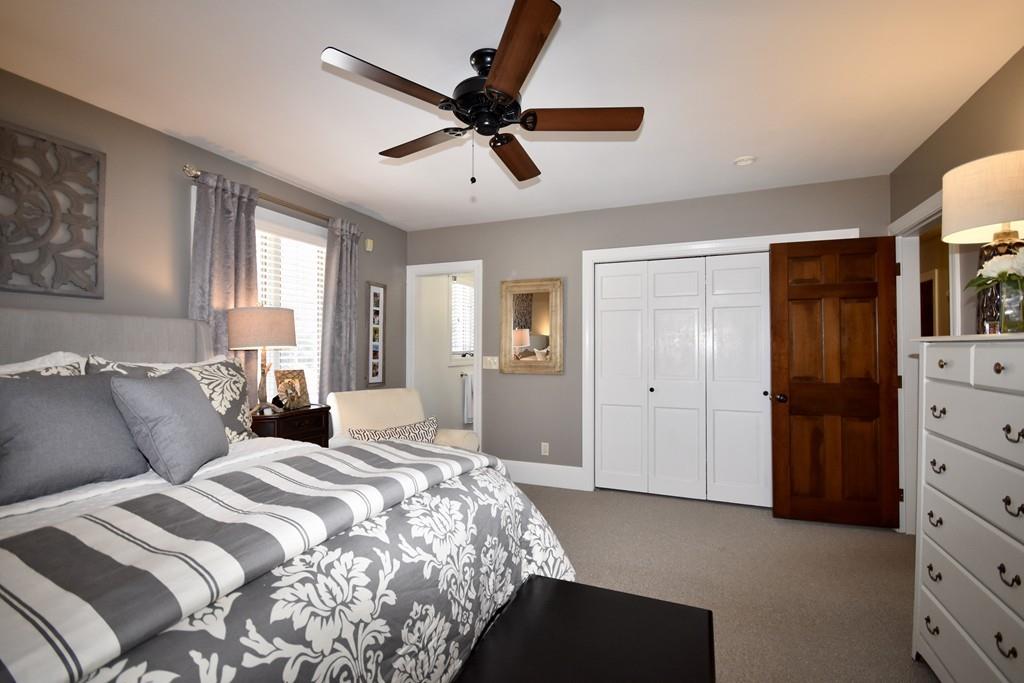 86 Snipatuit Road Rochester, MA 02770 - Photo 29 of 36 a bedroom with a bed and a dresser