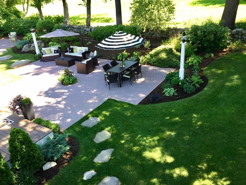 86 Snipatuit Road Rochester, MA 02770 - Photo 33 of 36 a view of a table and chairs in backyard of the house