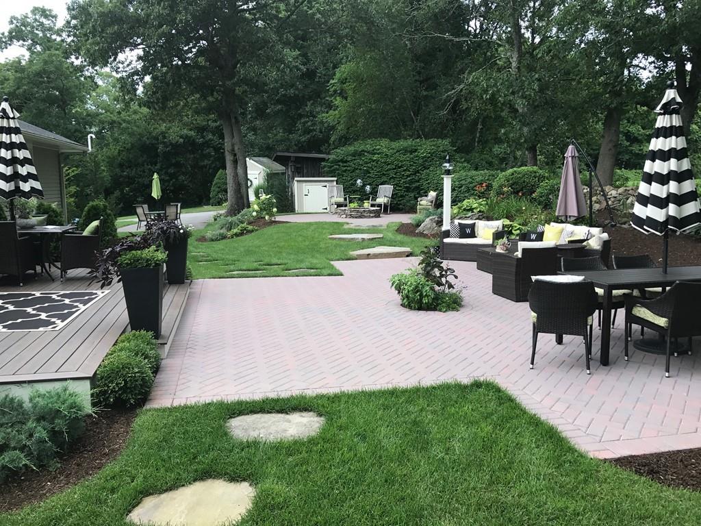 86 Snipatuit Road Rochester, MA 02770 - Photo 35 of 36 a view of a table and chairs in the garden