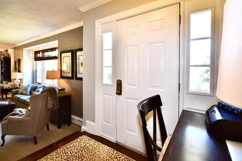 86 Snipatuit Road Rochester, MA 02770 - Photo 6 of 36 a view of a hallway with workspace and windows