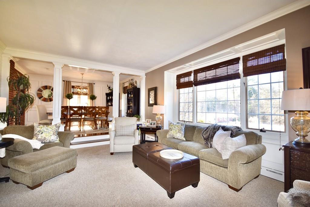 86 Snipatuit Road Rochester, MA 02770 - Photo 8 of 36 a living room with furniture and a large window