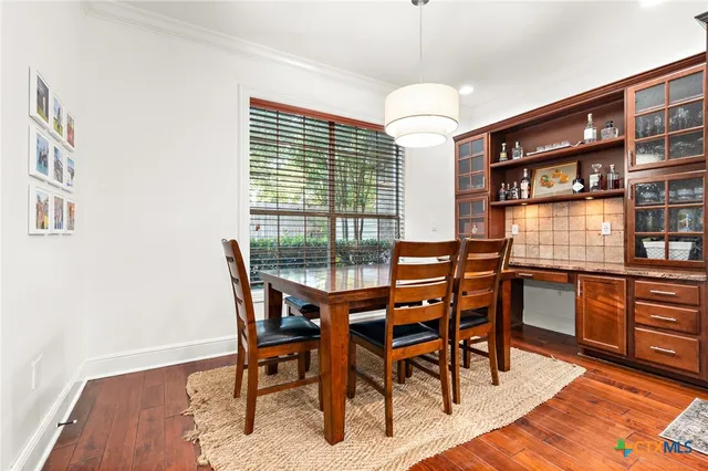 a bathroom with a sink a vanity and a mirror