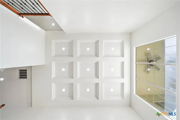 a kitchen with granite countertop lots of counter top space and stainless steel appliances