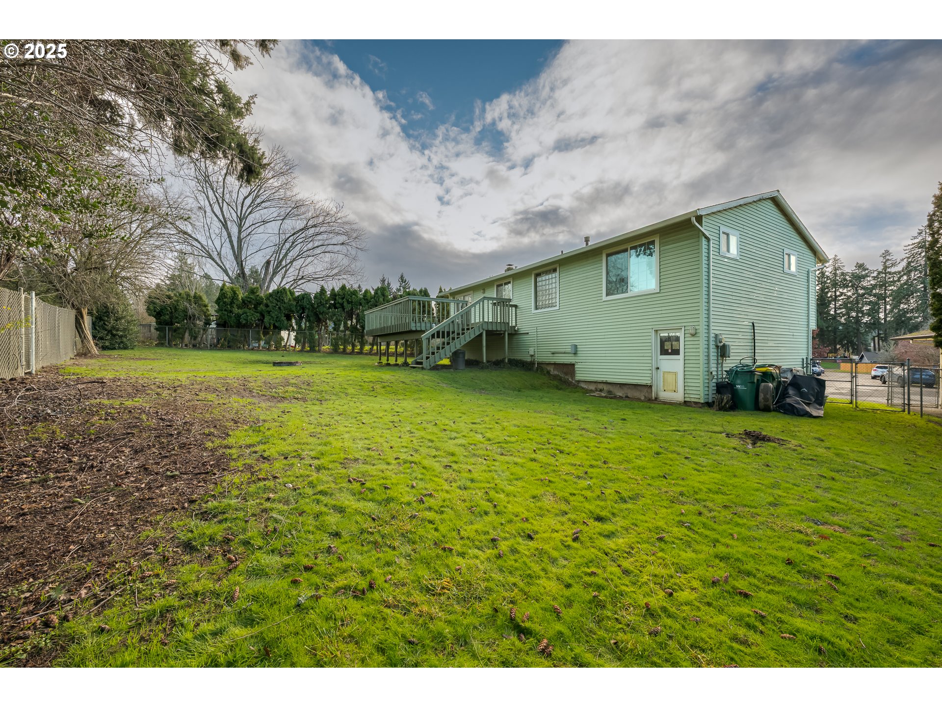 5970 Southwest 174th Avenue Beaverton, OR 97007 - Photo 27 of 36 a view of a big yard with a house