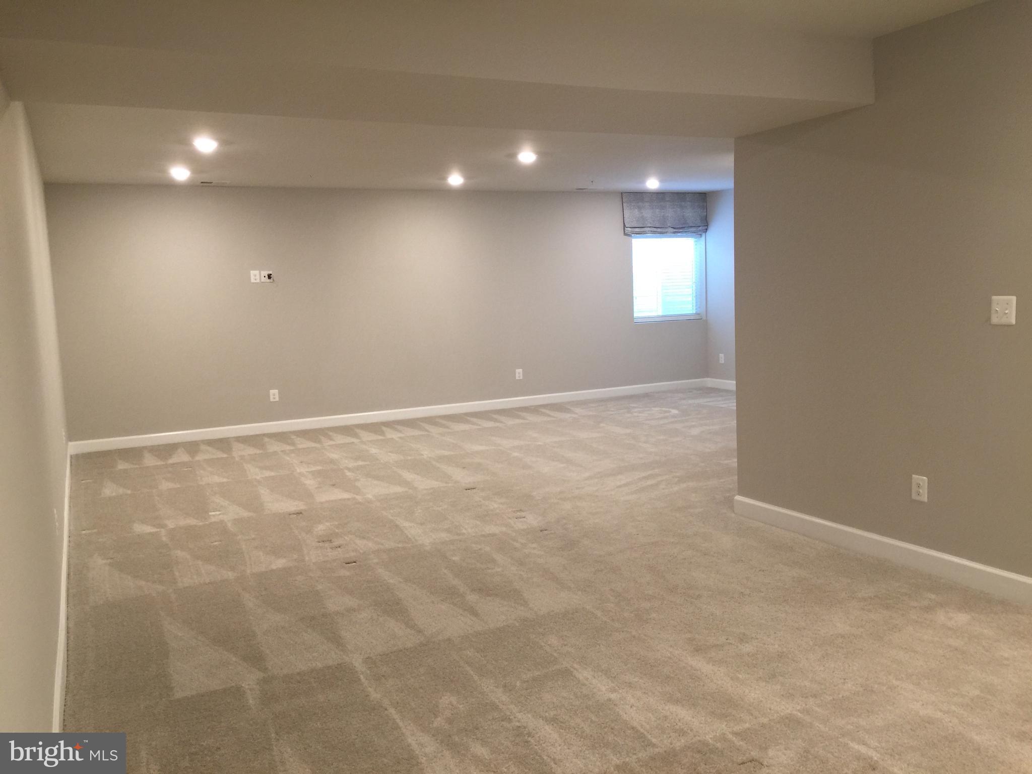 503 Cliff Lane Malvern, PA 19355 - Photo 15 of 38 a view of an empty room with window and pillar in it