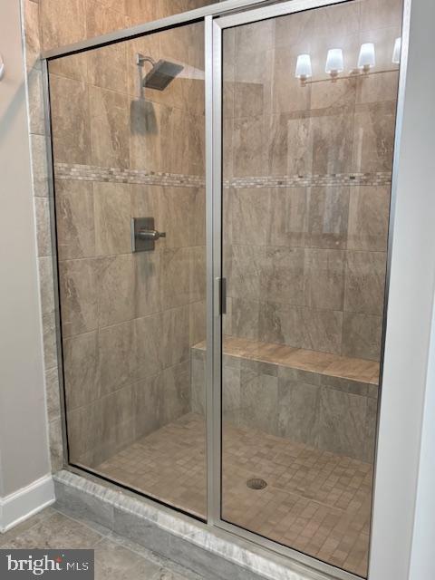 503 Cliff Lane Malvern, PA 19355 - Photo 36 of 38 a bathroom with a glass shower door