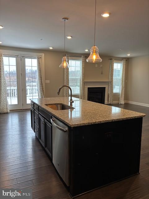503 Cliff Lane Malvern, PA 19355 - Photo 6 of 38 a kitchen with stainless steel appliances a kitchen island hardwood floor sink stove and wooden floor