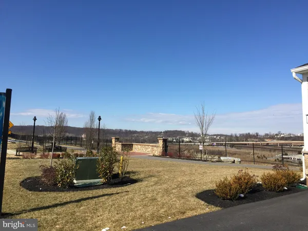 a view of a lake from a yard
