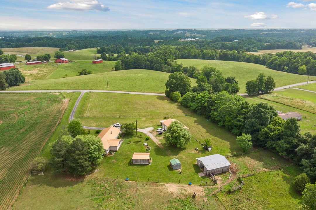 795 Owens Road Lafayette, TN 37083 - Photo 11 of 50 a view of a golf course with chairs