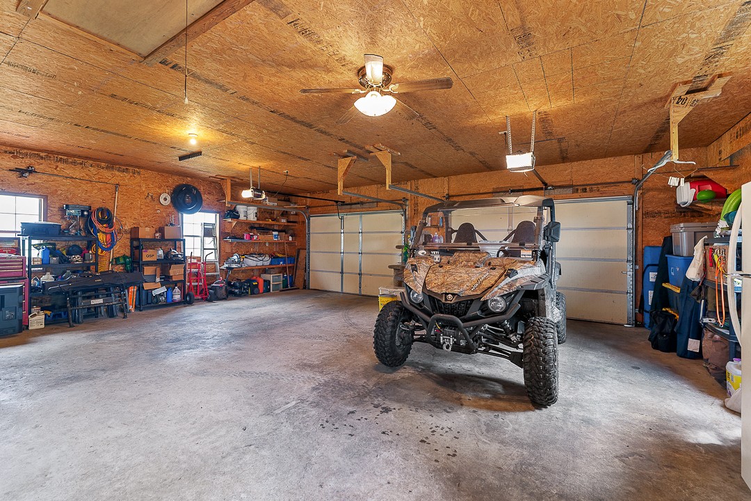 795 Owens Road Lafayette, TN 37083 - Photo 33 of 50 a view of a storage room with a table and chairs