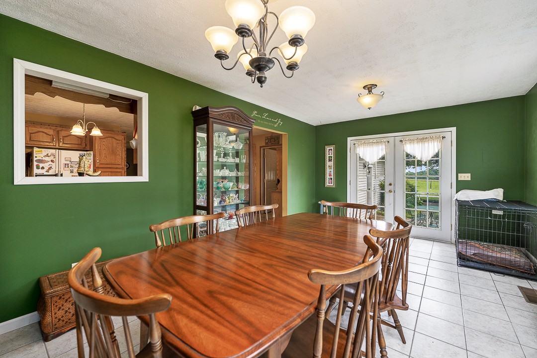 795 Owens Road Lafayette, TN 37083 - Photo 36 of 50 a view of a dining room with furniture window and outside view