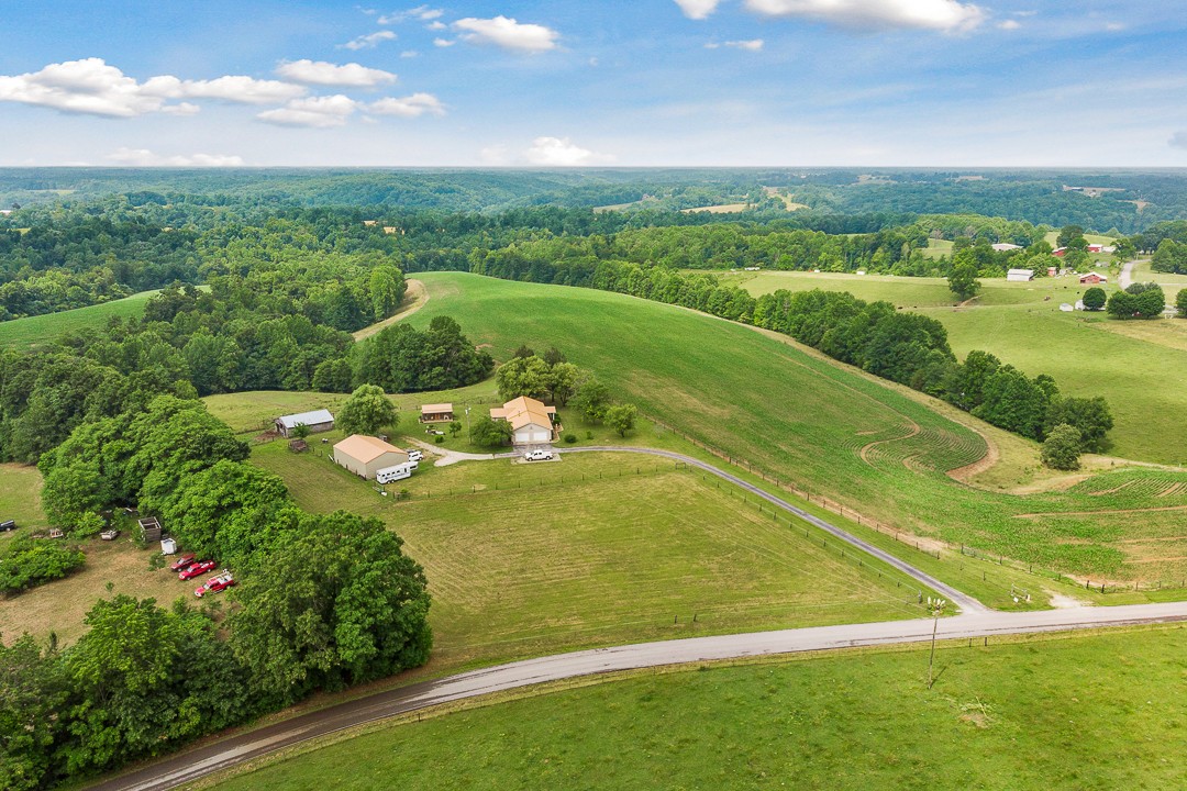 795 Owens Road Lafayette, TN 37083 - Photo 4 of 50 a view of a lake with a yard