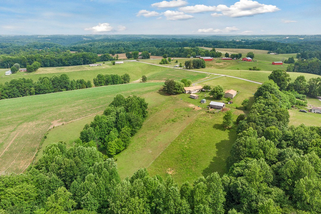 795 Owens Road Lafayette, TN 37083 - Photo 7 of 50 an aerial view of a houses with outdoor space and city view