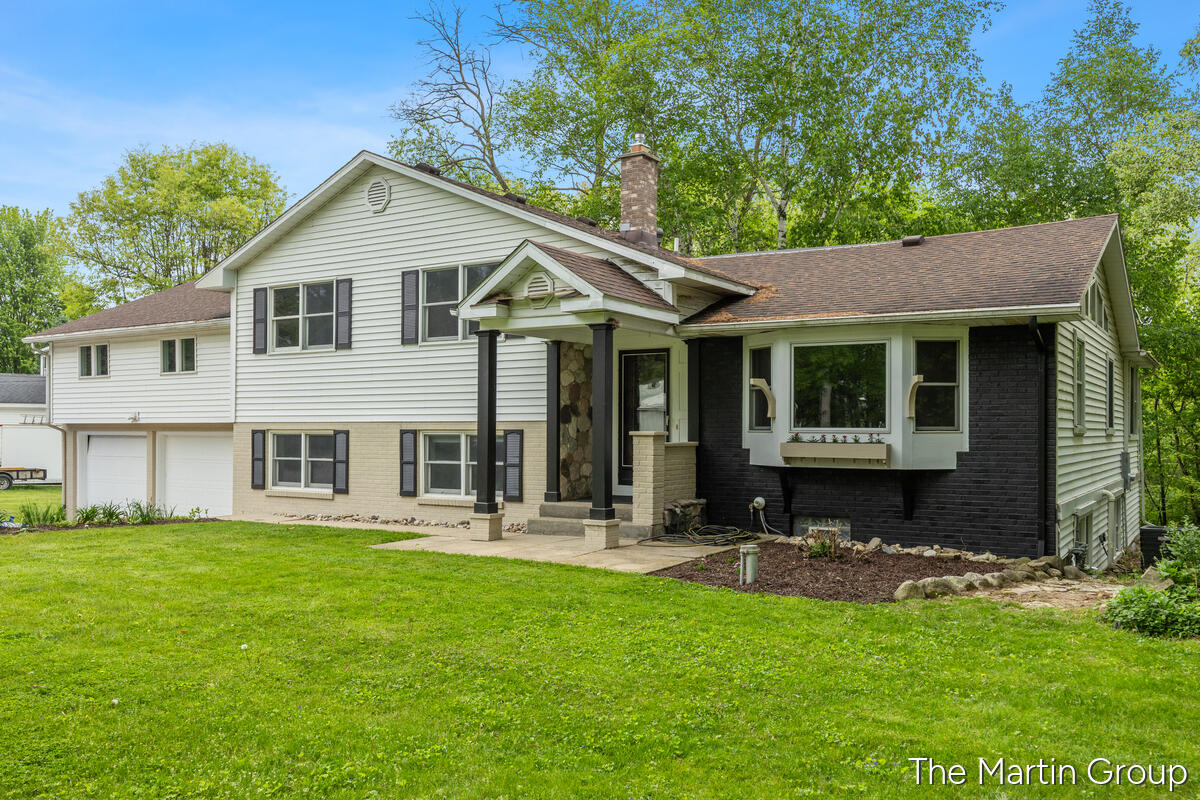 6610 Riga Avenue Northeast Rockford, MI 49341 - Photo 3 of 50 Front Exterior